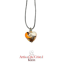 Load image into Gallery viewer, Pendentif Coeur en Cristal 25 mm. Cordon noir effet cuir réglable (50/55 cm) Le modèle se décline en différents coloris : Orange/brun/blanc