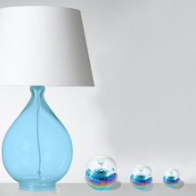 Load image into Gallery viewer, Mise en situation sulfure presse papier, modèle "Univers". Le modèle se décline en différentes tailles.