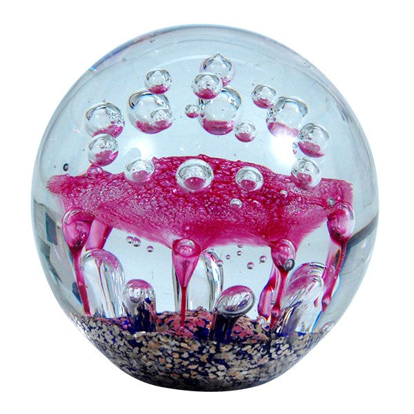 Sulfure en cristal gros modèle. Base bleue cobalt et doré haut rose voguant dans les flots